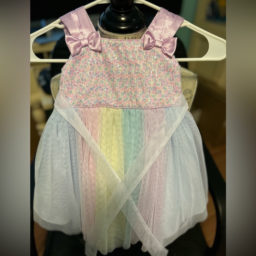 Lovely sleeveless pastel colored tulle dress by Jona Michelle. Size 3 Toddler.